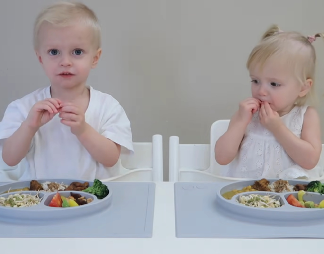 Two kids eating