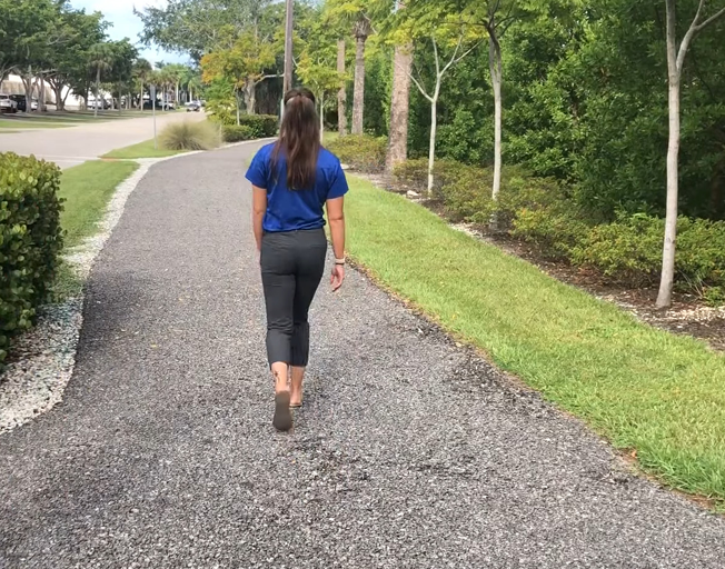 A woman walking outside