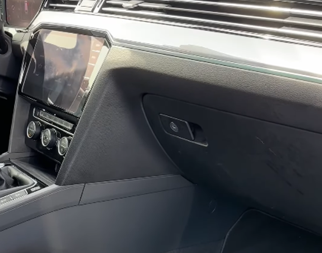 Car dashboard with a glove compartment