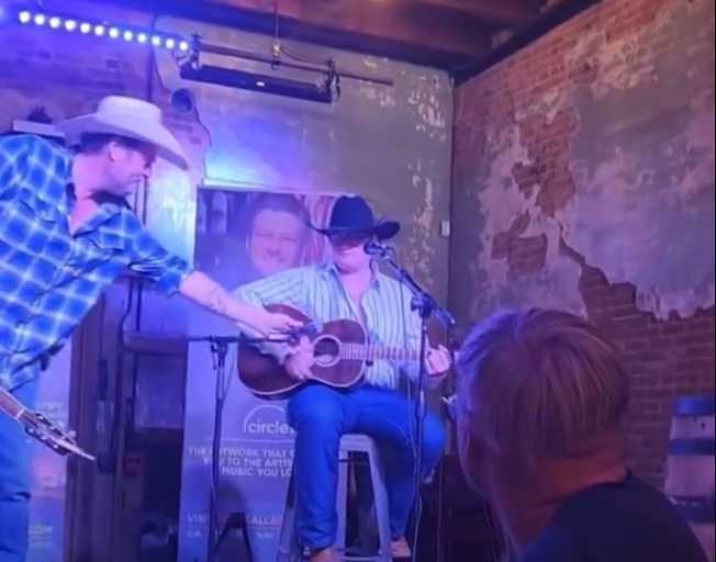 Blake Shelton and his step-son Zuma on stage at Ole Red Bar in Tishomingo, Oklahoma