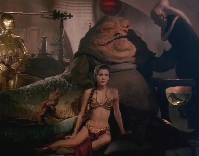 Carrie Fisher as "Princess Leia" in 'Star Wars: Return of the Jedi' wearing gold bikini