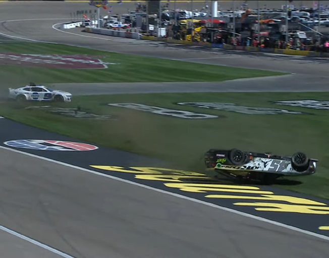 Chase Elliott's car spinning in the infield while Tyler Reddick's car flips at Las Vegas Motor Speedway 10-20-24